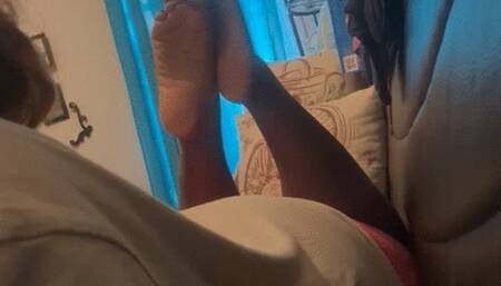 NJ Americana Student’s Plump, Wrinkly Soles Up In Air While Lying On Couch