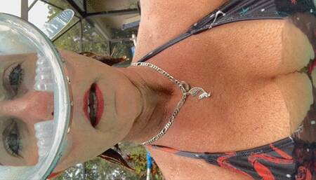 Carissa in her pirate bikini and Keds with breasts exposed--dancing for you!