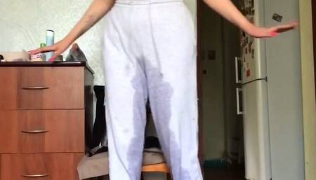 Lisa massages her breasts and pee in her pants