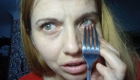 Poke an eye on a fork