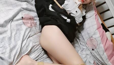 My maid, bound on the bed, tempted me with her feet