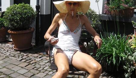 Sunny smoke in white tankini