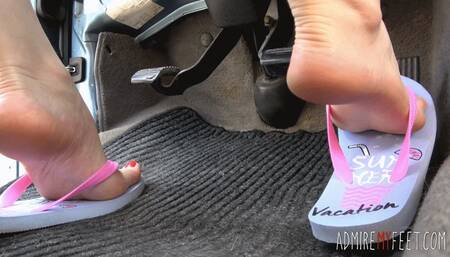 Zuzana's feet and flip flops pumping pedals (MOBILE)