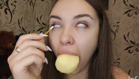 A witch cleans her eyes before an amputation