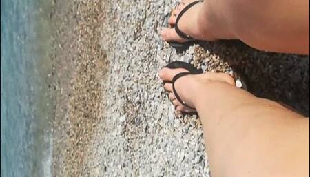 Feet playing with gravel!