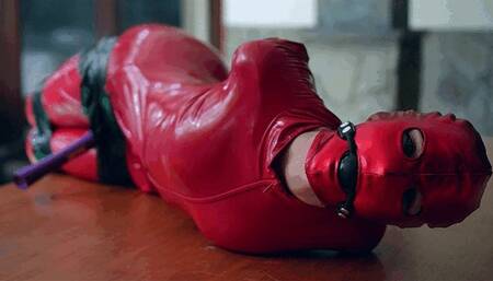 Red latex doll tape bondage with vibrator