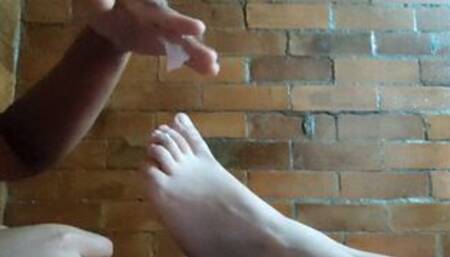 her feet are small, soft and beautiful i love touching them i imagine licking them and rubbing my penis with them