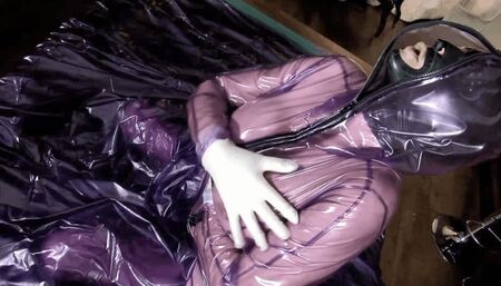 Heavy Rubber Bitch Masturbates Full Encased In Plastic Sleepsack