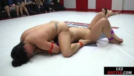 Lesbian busty Black and white MILFS enjoy public wrestling