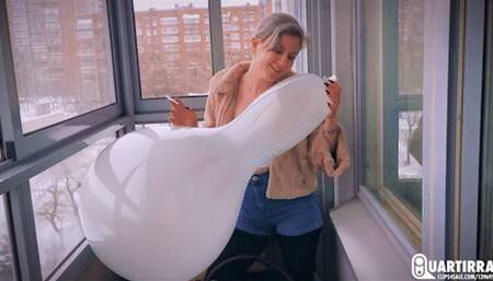 C132 Stasia smokes and btp's two Longnecks on a balcony -1080p