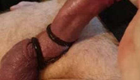 Edging handjob on a strapped down and gagged naked man