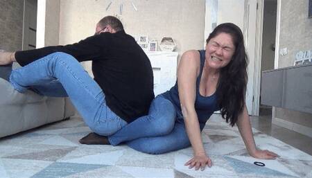 A MAN SITTING ON BOTH EVELINA'S FOOTS WITH FULL WEIGHT (120KG) (ah)