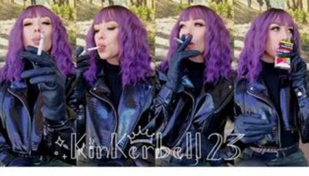 Chain-smoking outdoors wearing PVC & Leather