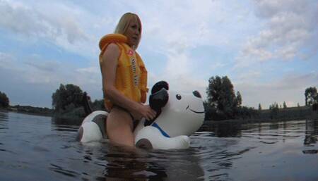 Alla hotly fucks a rare inflatable puppy on the lake and wears an inflatable vest for safety!!!