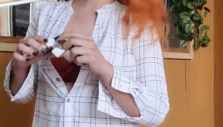 Smoking cork at home in panties, bra and open shirt