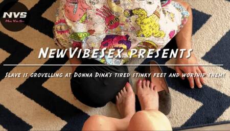 Slave is grovelling at Donna Dina’s tired stinky feet and worship them!