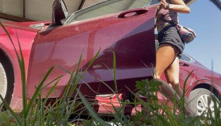 After a long road trip a girl has to PEE