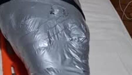 Man mummified by woman