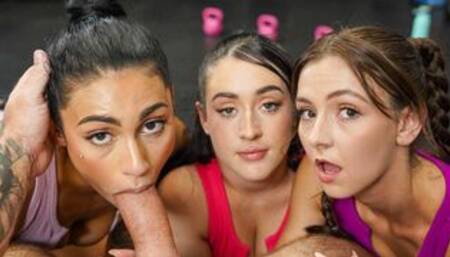 Girlfriends working hard for gym membership