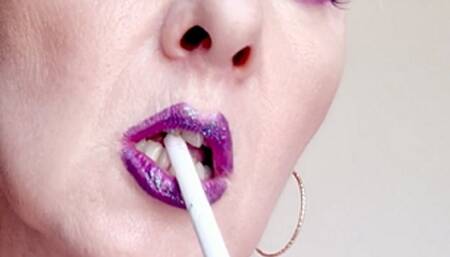 Extreme close up smoke EVE 120s with purpel lips, eye make up and bra