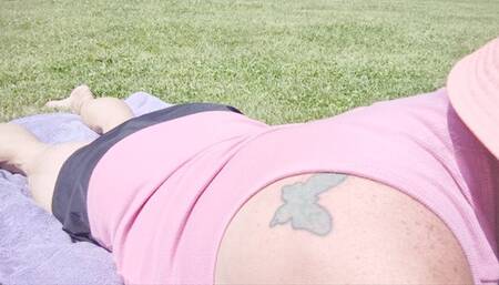 Tempest working on her tan