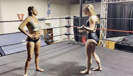 Two Barefoot Amazons Pin Each Other Multiple Times