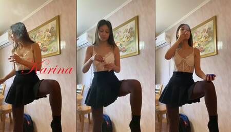Karina craves and smokes two cigs at once in lingerie and miniskirt