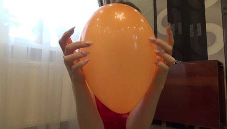 Popping balloons with long nails