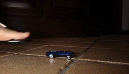 Italian girlfriend - metal toy cars stomped in flat sandals
