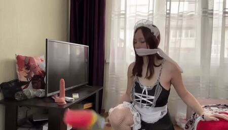 Gagged maid fucks herself
