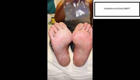 Delicious bags up grey socks after working outside