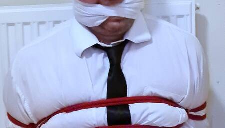 Man tied up in adult schoolgirl uniform by woman and used on bed 9