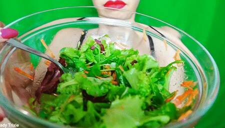 chewing and eating colorful salad -720p