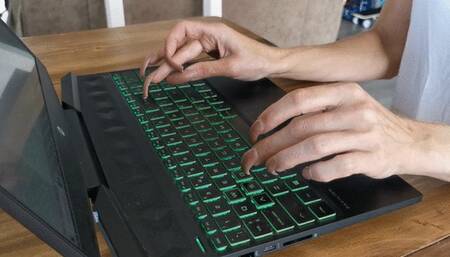 Long nails typing keyboard