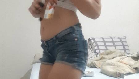 Exclusive!Chaismoke having fun chewing gum, smoking and showing a full ashtray - wearing converse sneakers