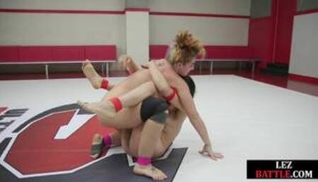 Wrestling lezdom strapon fucks loser babe in wrestling hall