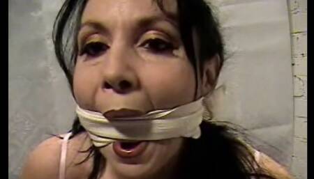 Self bondge gagging rubbing lotion on feet and smoking my marlboro reds