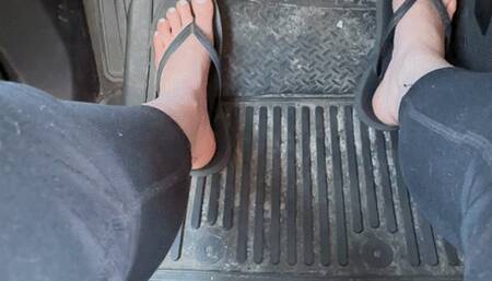 Trixie Love Pedal pumping in black flip flops