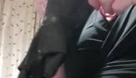 Gloved handjob and polishing on a spreadeagled naked man