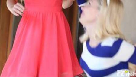 Cherie Deville and Aaliyah Love on an orange patterned bed in several lesbian scenes