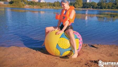 Q890 Stashia pops her vest, floaties and beachball on a lake - 480p