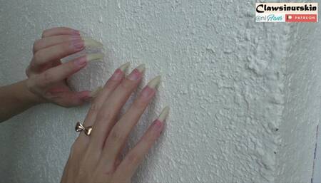 scratching the wall on my balcony