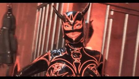 The Devil In Rubber Catsuit And His Latex Slave In Cage