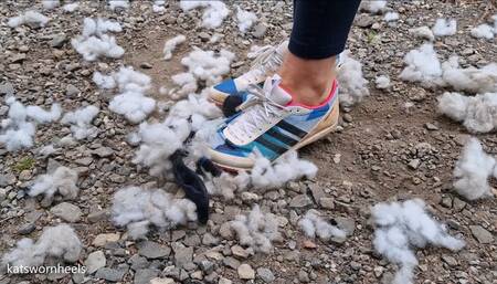 Kat Shreds Poor Teddy Under Her Track Spikes