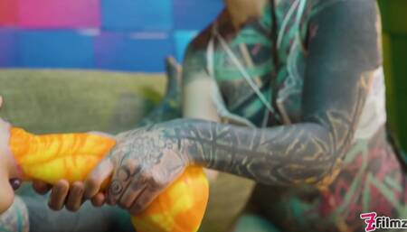 Two tattooed girls get ass fucked by a big dick