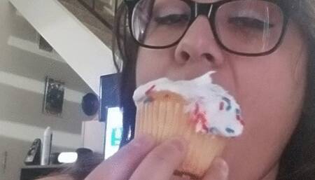 Pretty mouth eating cupcake
