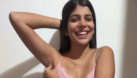 Adorable latin beauty tickles herself