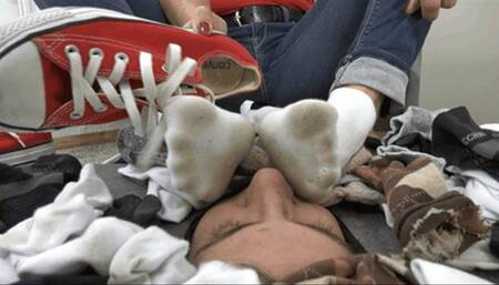 Helplessly buried under a pile of stinky socks