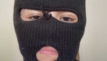 Masked Asian eating