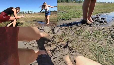 Lucy and Nastya having fun walking in the ankle deep mud
